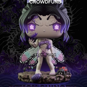 Puede incluir: Figura coleccionable de un personaje con alas de mariposa, cabello morado y el texto "DEMON SHINOBU". La figura tiene un diseño detallado con acentos morados y está sobre una base con una mariquita. También se ven los textos "PATREON" y "STUDI MADO".