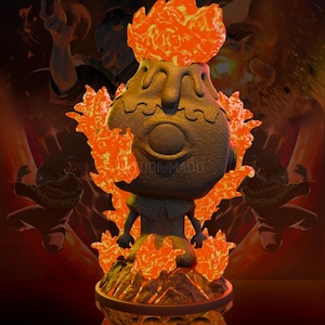 May include: A stylized figurine of a volcano with a face, surrounded by orange flames. The figurine is dark brown with orange accents, and the base has the word "JOGO" in yellow. The background features shadowy figures and more flames.