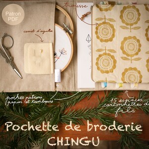 May include: A beige fabric embroidery kit with a zippered pouch, a hoop, a needle case, and a pattern. The pouch has a floral print in yellow and white. The kit is labeled "Pochette de broderie CHINGU".