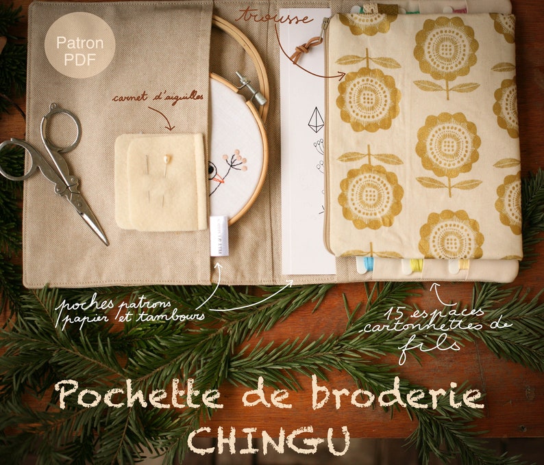 May include: A beige fabric embroidery kit with a zippered pouch, a hoop, a needle case, and a pattern. The pouch has a floral print in yellow and white. The kit is labeled "Pochette de broderie CHINGU".