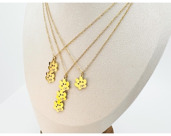 Gepersonaliseerde pootafdrukketting: 18 kt vergulde koosnaamsieraden
