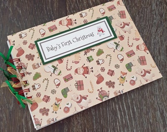 in box. Babys first christmas scrapbook brand new 
