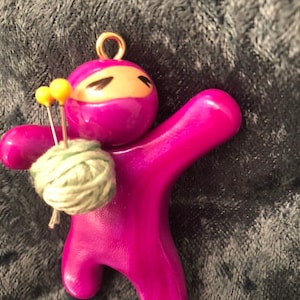 Adopt a Ninja: Knitting / Crochet Ninja Ornament with ball of yarn and needle(s)