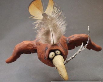 Nesting Bird Ceramic Sculpture with Twig