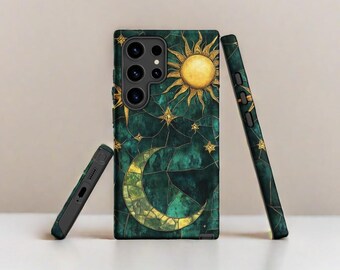 May include: A green phone case with a gold sun and moon design. The case has a cracked glass effect and a dark green background.