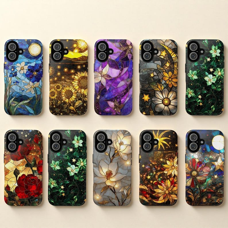 May include: A collection of ten phone cases with floral and celestial designs. The cases feature stained glass-style artwork with flowers, moons, and stars in various colors, including blue, purple, yellow, and red.
