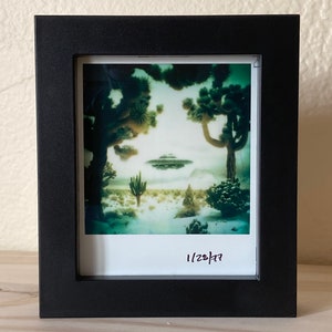 Framed Polaroid of a UFO Flying over Joshua Trees