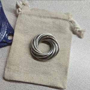 Stainless Steel Mobius Ball Fidget Toy: Pocket Anxiety Relief