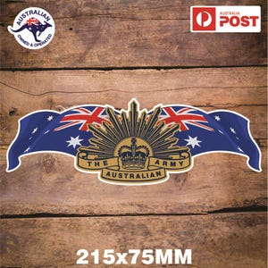 May include: A gold and blue sticker with the Australian Army logo. The logo features a crown, a rising sun, and the words "The Australian Army". The sticker is 21.5 cm by 7.5 cm.