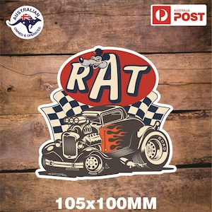 May include: A white sticker featuring a cartoon illustration of a hot rod car with flames and the word "RAT" in a red circle. The sticker is 105mm x 100mm.
