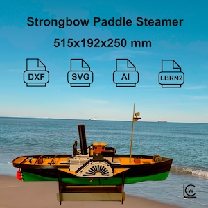 Könnte beinhalten: Ein Holzmodell eines Raddampfers, bemalt in Schwarz, Grün, Gelb und Rot, mit dem Text "Strongbow Paddle Steamer" und Dateityp-Symbolen. Das Modell misst 515x192x250 mm.