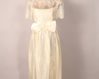 Vintage 80s Ivory Cream Lace Dress with Satin Bow Size S 25" waist wedding