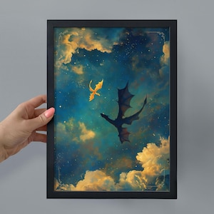 May include: Framed art print featuring two dragons soaring through a celestial sky. One dragon is gold, the other is dark with outstretched wings. The background is a mix of blue, gold, and white, creating a dreamy atmosphere.