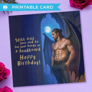May include: A square printable greeting card featuring a muscular winged figure standing before a moonlit arched window. The text reads: Still not too old to Put your hands on a headboard Happy Birthday! The card has a dark blue background.