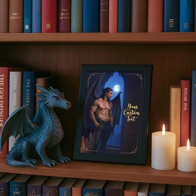 May include: A framed print with a muscular man with wings, standing in a doorway with a moon in the background. The text "Your Custom Text" is below the image. A blue dragon statue and two white candles are on a wooden shelf with books.