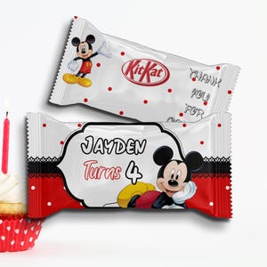 May include: Two Kit Kat candy bars with Mickey Mouse graphics. One bar has the text "Thank You For" and the other says "Jayden Turns 4". The wrappers are white with red polka dots and red accents.