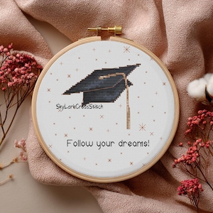 May include: A trio of ceramic mugs with a speckled, matte finish in light blue, cream, and grey. The mugs have a simple, modern design and a comfortable handle, ideal for tea or coffee.