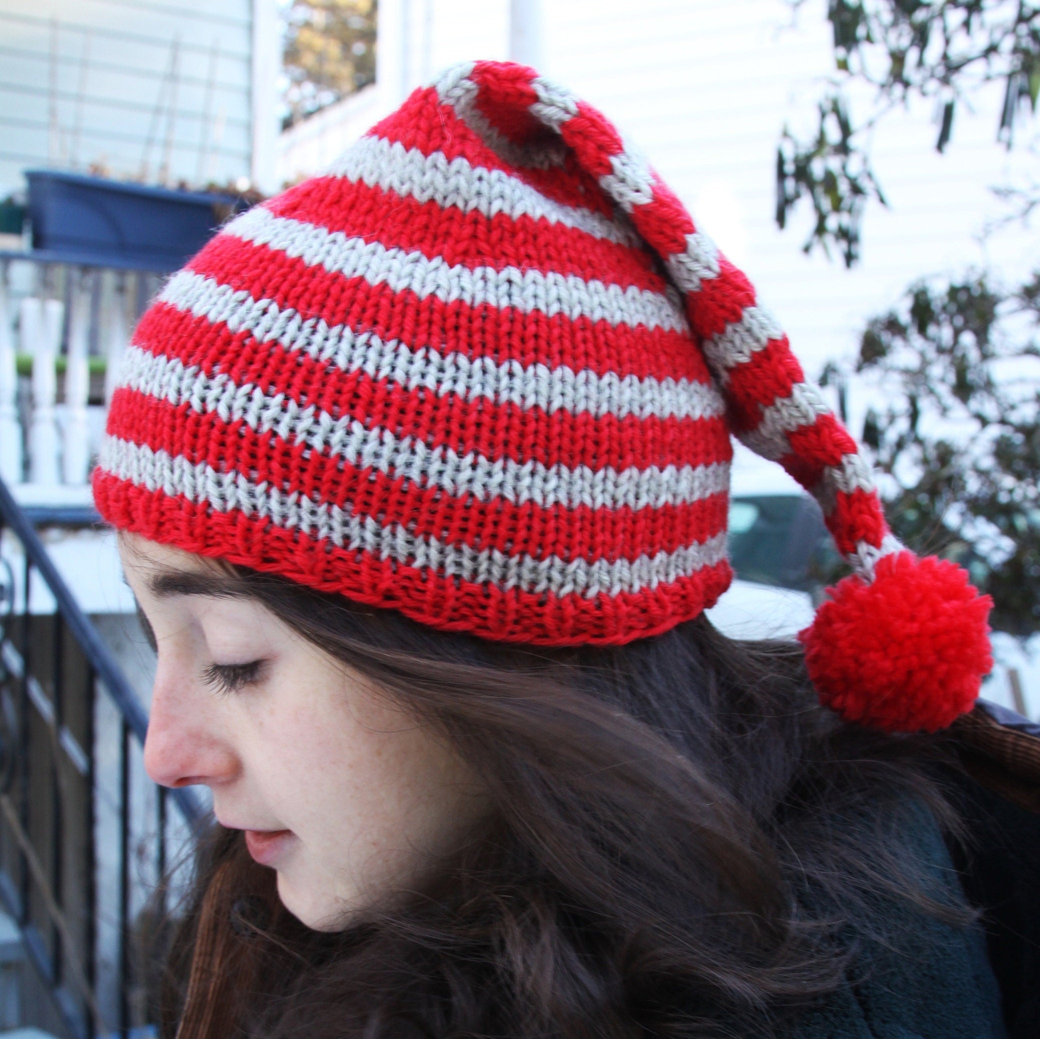 red stocking cap with pom pom