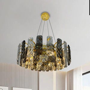 Subtle elegance: Modern 4-light wagon wheel design with a crystal pendant chandelier