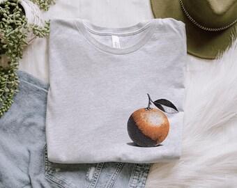 Minimalistisk orange skjorta, sommarfruktgrafik-t-shirt, vintage-t-shirt med botanisk konst