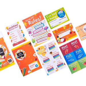 May include: A set of colourful printable classroom charts and cards for a school lunch programme. The charts include "Lunchtime Behaviour Chart", "Dining Hall Rules", "Play Lunchtimes", "Super Sign Pack", "Menu", "Lunchbox Award", and "I've had a bump". The cards include "Meat Lunch Card", "Fish Lunch Card", and "Vegetarian Lunch Card".