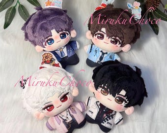 May include: Four plush dolls with embroidered facial features and hair in purple, brown, white, and black. Each doll wears a detailed outfit and has a small decorative charm attached to the top. The text MirakuChoco is visible.