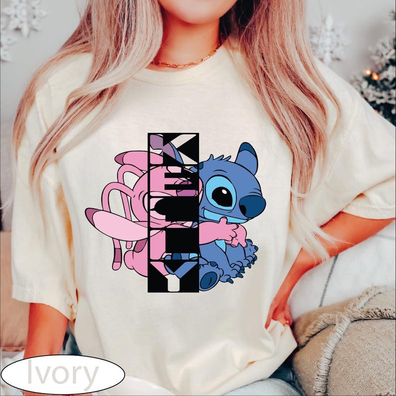 a woman wearing a t - shirt with a cartoon character on it