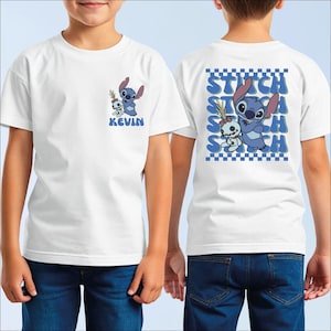 A boy wearing a white t-shirt with a graphic of Stitch and Kevin printed on it.
