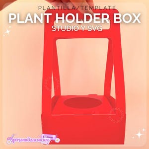 Puede incluir: Una caja roja para macetas con asa, diseñada para sostener una pequeña planta en maceta. El texto "PLANT HOLDER BOX" se muestra en la parte superior. El diseño incluye una abertura circular en la base para la maceta. También se ven las palabras "STUDIO Y SVG".