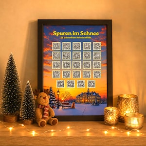 May include: A framed poster titled Spuren im Schnee 24 winterliche Kriminalfälle featuring a sunset landscape with a snowy manor, a dog, and twenty-four numbered QR code squares arranged in a grid, displayed in a black frame on a wooden surface.