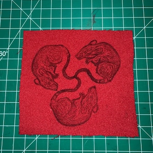 Hand-Stamped Rat King Patch on Recycled Red Fabric (6”x6")