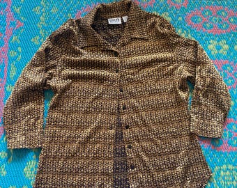 Blusa de encaje transparente negra y dorada de Chicos vintage, estilo años 90, con botones, estilo romántico para noche y fiesta. Blusa de encaje llamativa con botones para trabajar.