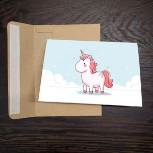 Carte d'anniversaire licorne anime pour fille - Faire-part de fête licorne dessin animé rose et blanc - Carte à l'unité avec enveloppe ou lot de 5