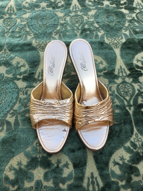 Vintage gold slippers