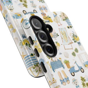 May include: White phone case with a repeating pattern of beach-themed illustrations. The design includes lemons, flowers, beach chairs, a scooter, and other summer elements. The case has a glossy finish and a camera cutout.