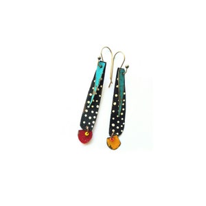 Black and white polka dot long pods with unmatched bits