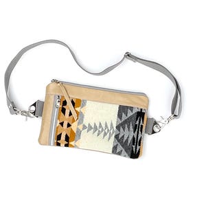 May include: A rustic wooden sign with the text "Welcome to our home" in white lettering. The sign features a distressed finish and a simple, inviting design, perfect for entryway decor.