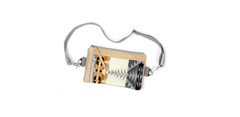 May include: A rustic wooden sign with the text "Welcome to our home" in white lettering. The sign features a distressed finish and a simple, inviting design, perfect for entryway decor.