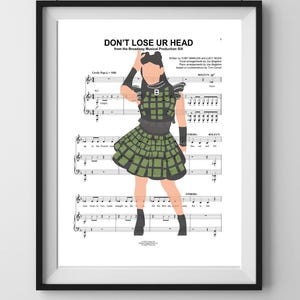 May include: A sheet music score for the song "Don't Lose Ur Head" from the Broadway musical production Six. The score features a black and white illustration of a woman in a green and black plaid dress and a black vest. The text "Don't Lose Ur Head" is printed in black at the top of the page.