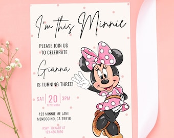 May include: A pink and white birthday invitation featuring a cartoon image of Minnie Mouse. The invitation says "I'm this Minnie" and includes the text "Please join us to celebrate Gianna is turning three!"  The invitation also includes the date, time, and location of the party.