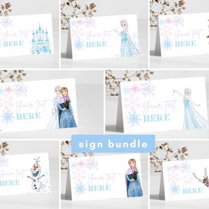 May include: A set of printable Frozen-themed signs with a blue and pink snowflake design. The signs feature various characters from the movie, including Elsa, Anna, Olaf, and Kristoff. The text on the signs reads "Your text here".