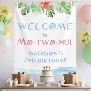 May include: A party scene with balloons and a banner that reads "Welcome to Mo-Two-Nui, Madison's 2nd Birthday." The banner has floral and tropical leaf accents. A two-tiered cake and gifts are on a table.
