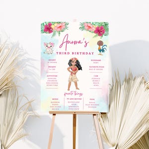 May include: A personalized birthday party sign on an easel. The sign features the name "Aurora's" and "THIRD BIRTHDAY" in script. It includes illustrations of characters, favorite things, and measurements. The sign is decorated with watercolor floral accents and is 38 inches tall.