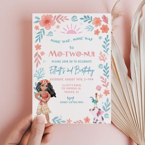 May include: A rectangular birthday invitation card featuring a tropical floral border with pink, blue, and coral elements. The text reads: Make way, make way to Mo-Two-Nui, please join us to celebrate Elliott's 2nd Birthday, Saturday, August 19th, 2-4pm.