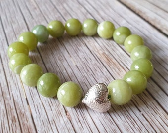 Lime Jade Heart Beaded Bracelet . thai hilltribe silver heart . 10mm beads . lime green stretch bracelet yoga nature love