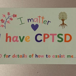 May include: A pale green card with the words "I matter, I have CPTDS" in colourful letters. The card includes a purple heart, a brain with roots, and the text "PTO for details of how to assist me..."