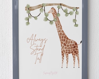 May include: A framed art print featuring a giraffe with a brown and tan spotted pattern, standing beneath a branch with green leaves. The text "Always Stand Tall" is written in a cursive font.