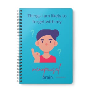 May include: A spiral-bound notebook with a teal cover featuring the text "Things I am likely to forget with my menopausal brain." The cover also includes an illustration of a person and question marks.