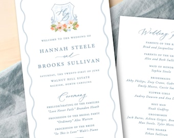 Light blue, wavy border wedding program with floral crest, tall printed order of events for wedding ceremony