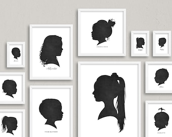May include: A collection of framed silhouette portraits in various sizes. Each frame contains a black silhouette of a person's profile against a white background. The portraits feature different hairstyles and ages, with names written below some.
